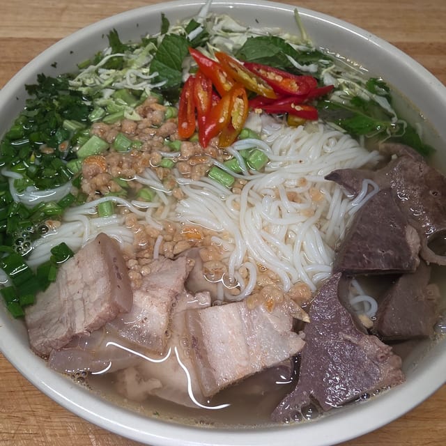 Nam Sai (clear pork noodle).